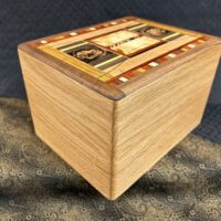 Urn: Oak with 150pc framed in Walnut